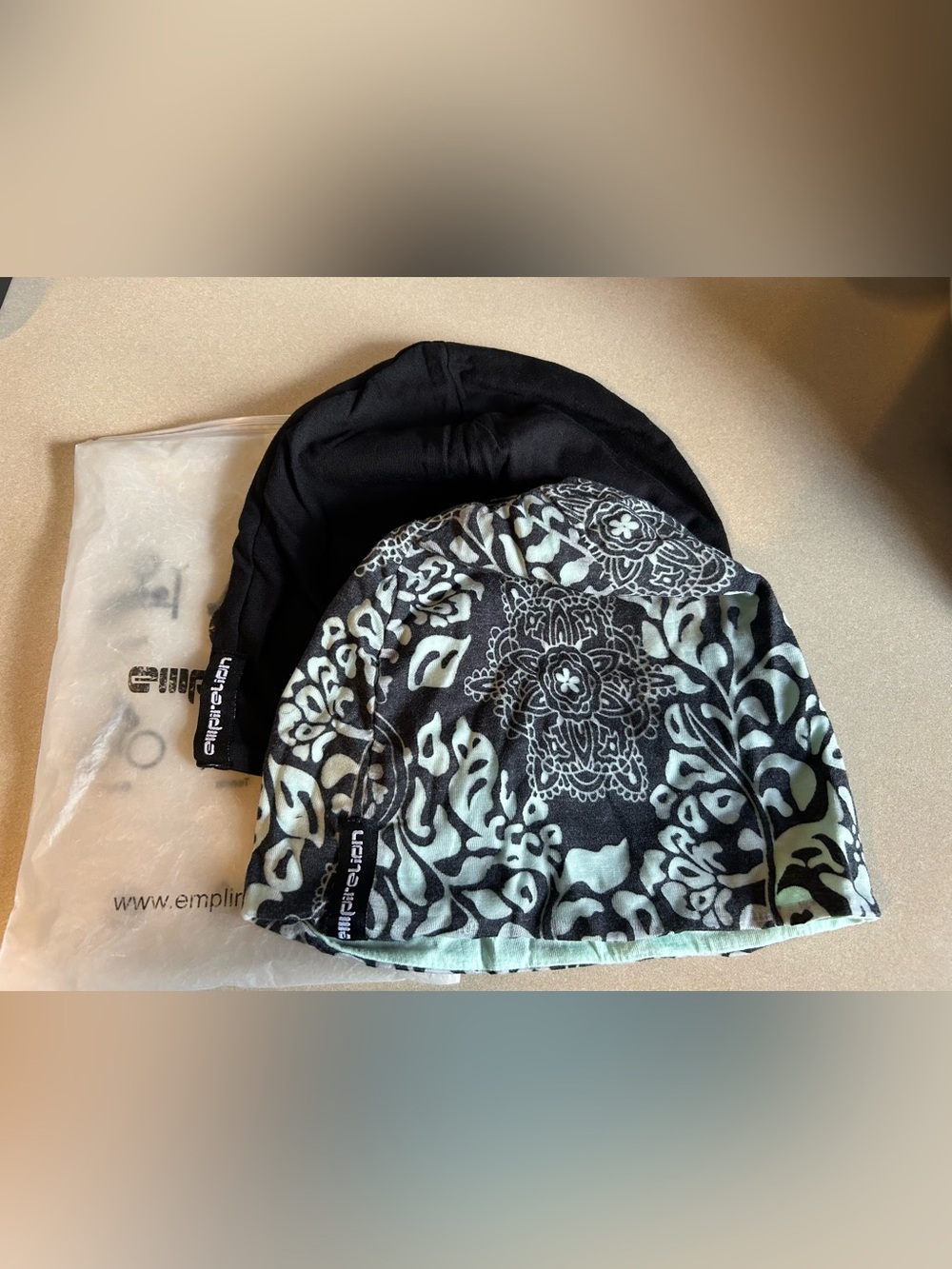 Empirelion lightweight, stretchy athletic skull caps or helmet liners.